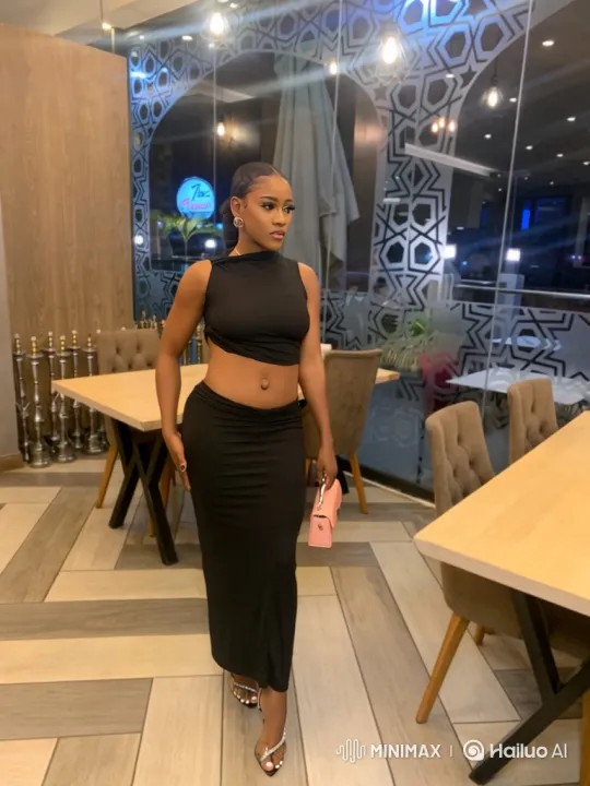 Elegant Woman in Modern Restaurant Setting – AI Generated Video | Hailuo AI