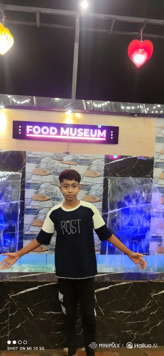 Young Man Admires BMW Parked at Futuristic Food Museum – AI Generated Video | Hailuo AI