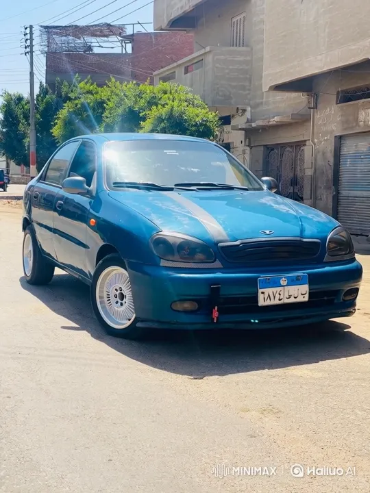 Custom Teal Sedan Deploys Air Suspension – AI Generated Video | Hailuo AI