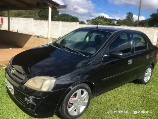 Black Sedan Lowering on Green Lawn – AI Generated Video | Hailuo AI