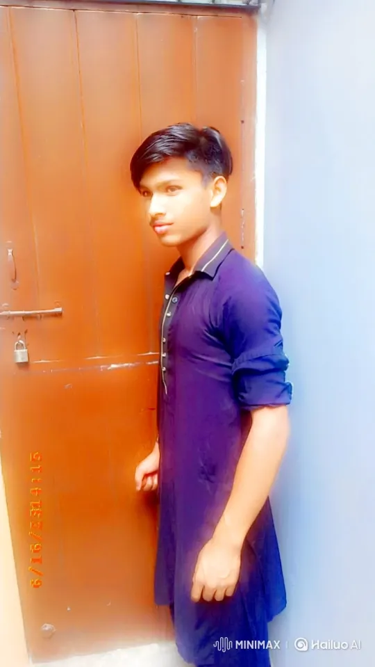 Young Man Smiles Gently by Wooden Door – AI Generated Video | Hailuo AI