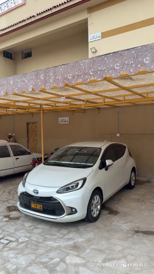 White Hatchback Deploys Air Suspension for Aggressive Stance – AI Generated Video | Hailuo AI