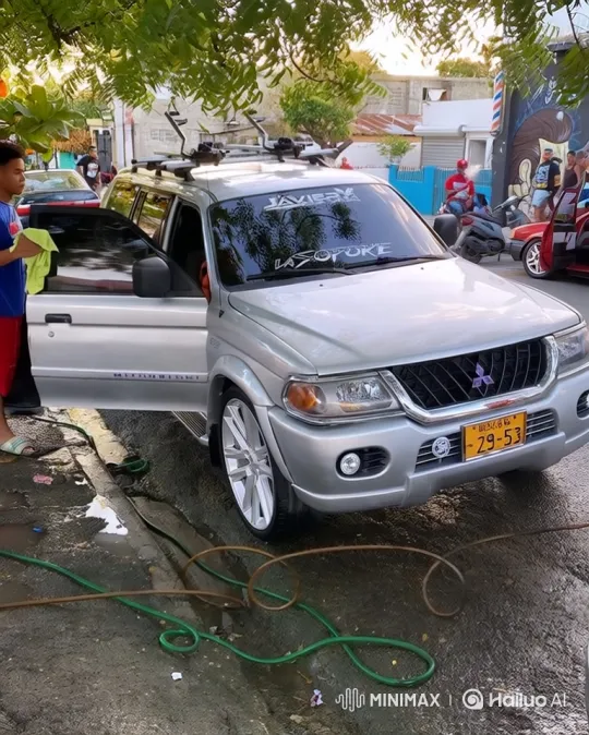 Silver Mitsubishi SUV Transforms with Hydraulic Lowering System – AI Generated Video | Hailuo AI