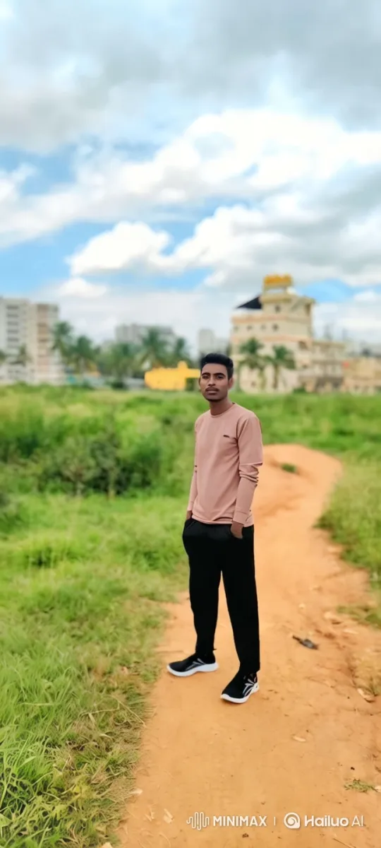 Young Man Stands Confidently in Lush Landscape – AI Generated Video | Hailuo AI
