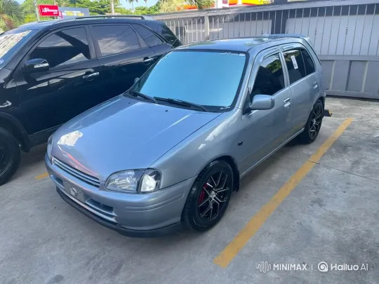 Custom Hatchback Demonstrates Air Suspension Lowering – AI Generated Video | Hailuo AI