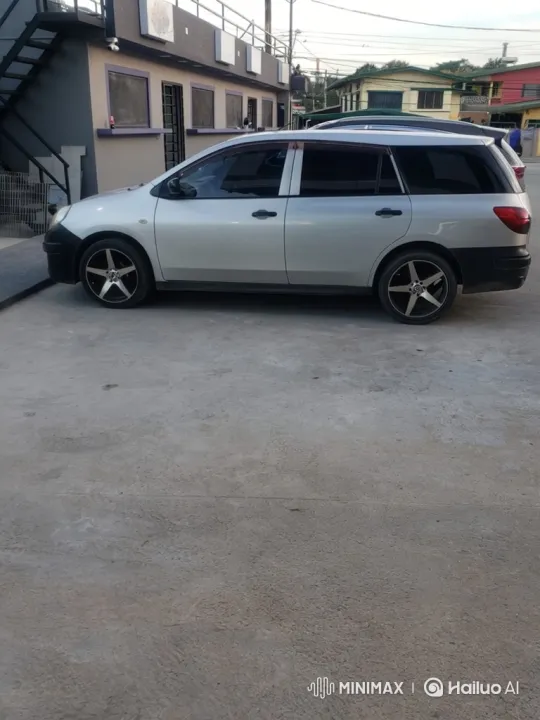 Silver Station Wagon with Custom Wheels and Air Suspension – AI Generated Video | Hailuo AI