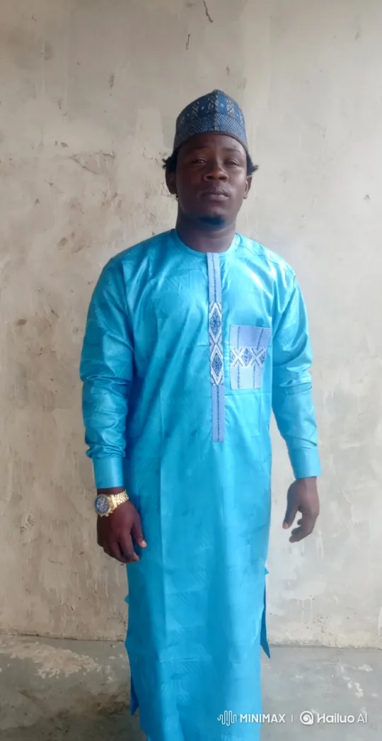 Man Walking with Steady Pace in Blue Tunic – AI Generated Video | Hailuo AI