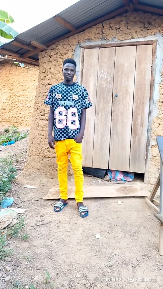 Young Black Man in Casual Attire Smiles Calmly – AI Generated Video | Hailuo AI