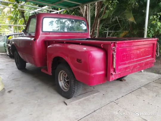 Old Red Chevy Truck Drives Out of Carport – AI Generated Video | Hailuo AI