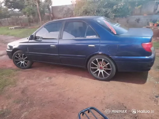 Stunning Blue Sedan Showcased in Peaceful Outdoor Setting – AI Generated Video | Hailuo AI