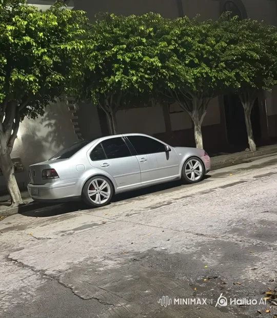 Silver Sedan Demonstrates Air Suspension Lowering – AI Generated Video | Hailuo AI