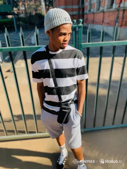 Young Man Prepares to Drive Black Car on Sunny Day – AI Generated Video | Hailuo AI