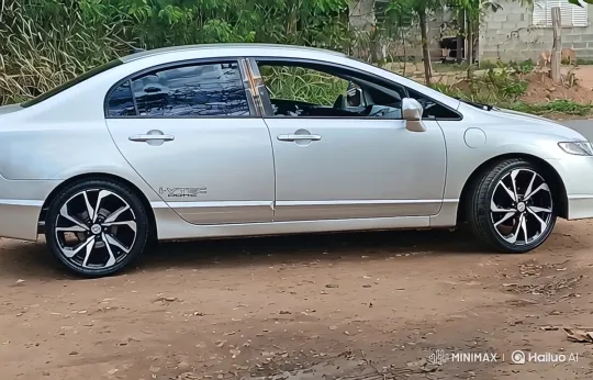 Tracking Shot of Custom Silver Sedan on Dirt Road – AI Generated Video | Hailuo AI