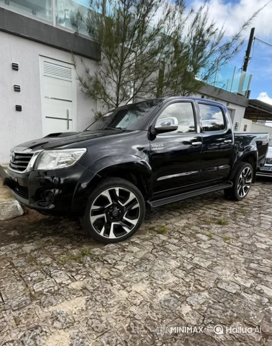 Pickup Truck Lowers on Cobblestone Driveway – AI Generated Video | Hailuo AI