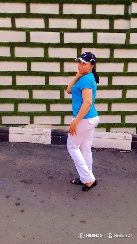 Woman in Blue Shirt Gets Into Sedan and Drives Off – AI Generated Video | Hailuo AI