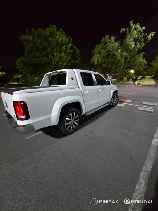 White Pickup Truck Transforms with Pneumatic Lowering – AI Generated Video | Hailuo AI