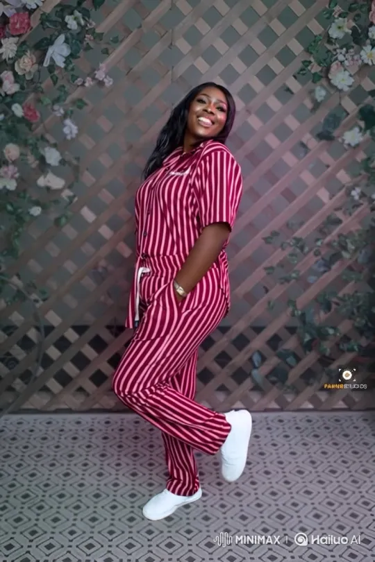 Joyful Woman Poses in Striped Outfit – AI Generated Video | Hailuo AI