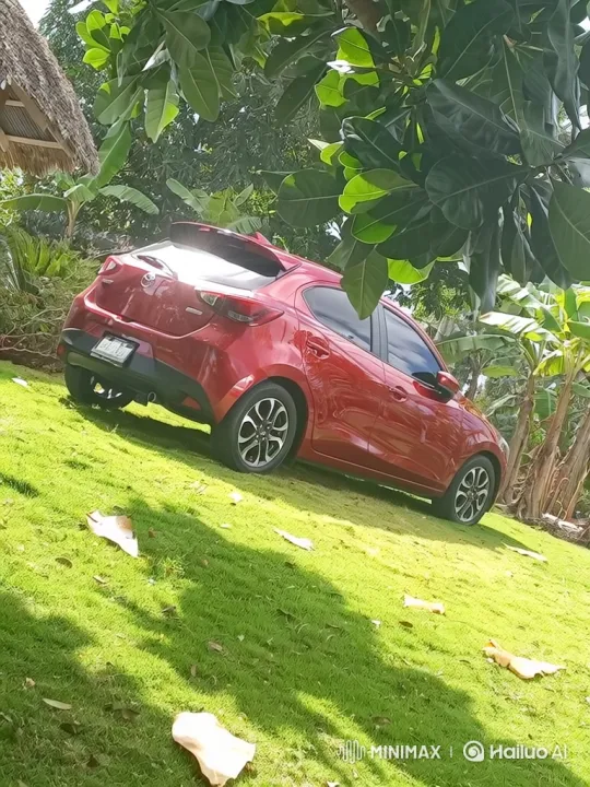 Red Hatchback Lowers on Tropical Hillside – AI Generated Video | Hailuo AI