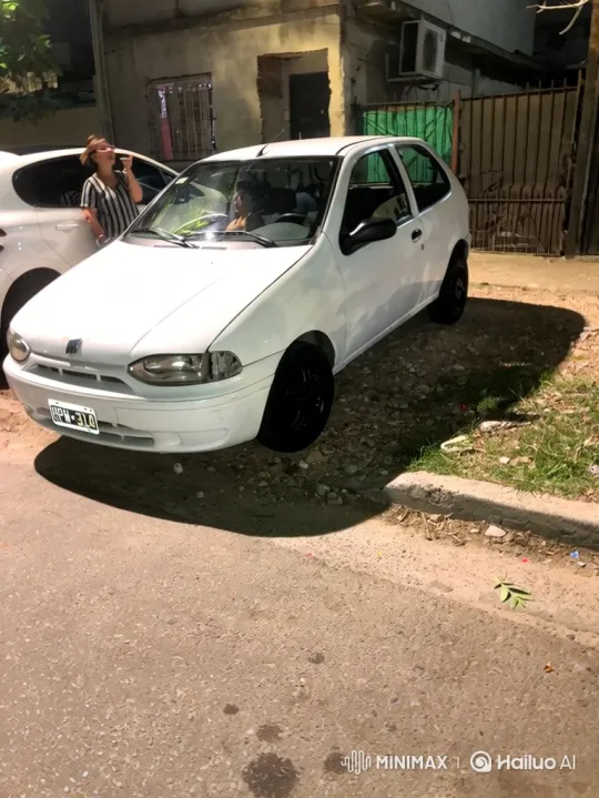 White Hatchback Lowered on Gravel Roadside at Night – AI Generated Video | Hailuo AI