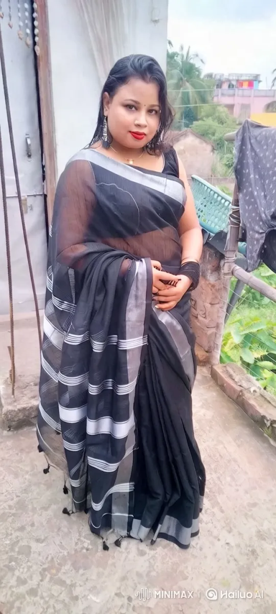 Woman in Black Saree with Silver Stripes - Aesthetic Scene – AI Generated Video | Hailuo AI