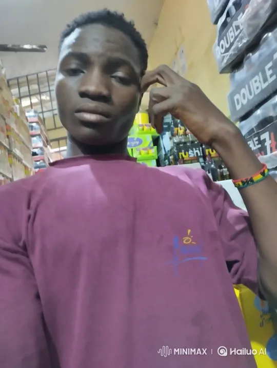 Young Black Man Reflects in Indoor Setting – AI Generated Video | Hailuo AI