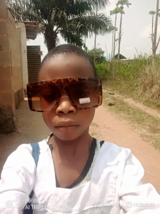 Young Person Stands Still Amidst Slowly Passing Car – AI Generated Video | Hailuo AI