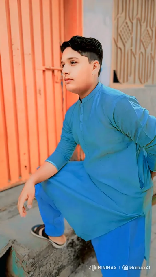 Young Man Reflects, Softens Gaze in Thoughtful Pose – AI Generated Video | Hailuo AI