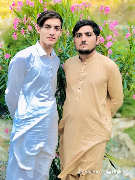 Young Couple Shares Quiet Moment in Traditional Attire – AI Generated Video | Hailuo AI
