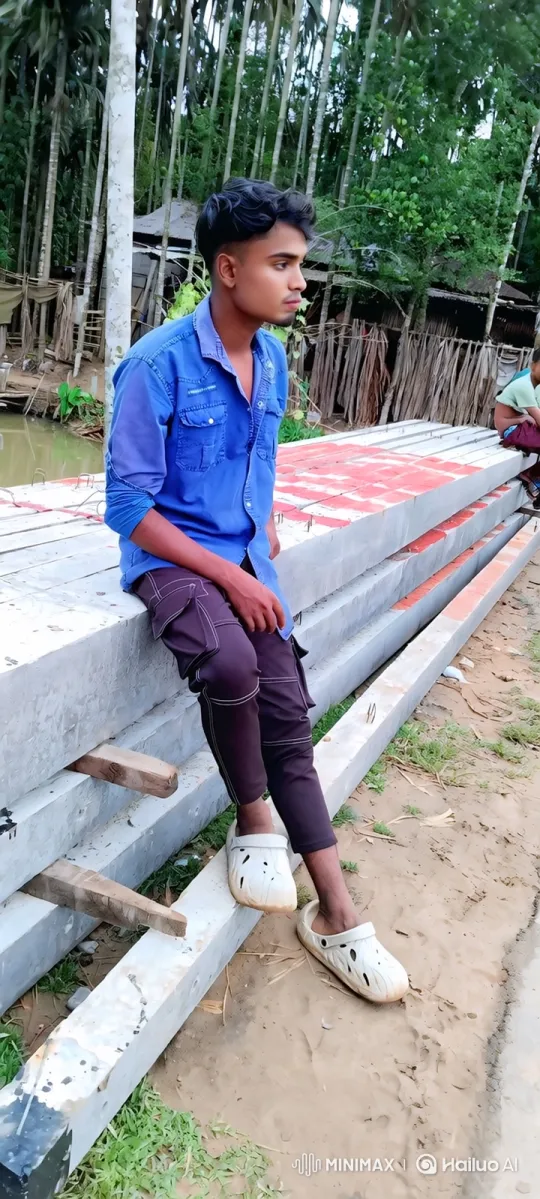 Young Man Contemplates in Rural Construction Site – AI Generated Video | Hailuo AI