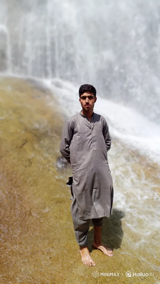 Romantic Couple by Waterfall at Golden Hour – AI Generated Video | Hailuo AI