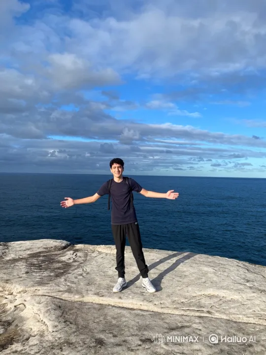 Young Couple Embraces on Rocky Cliff Overlooking Sea – AI Generated Video | Hailuo AI