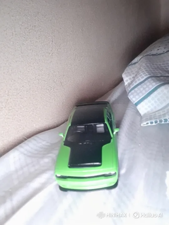 Toy Car Levitates Above Fabric Surface – AI Generated Video | Hailuo AI
