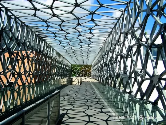 Modern Pedestrian Bridge with Geometric Shadow Play – AI Generated Video | Hailuo AI