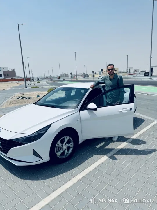 Man on Car in Parking Lot with Rising Camera Angle – AI Generated Video | Hailuo AI