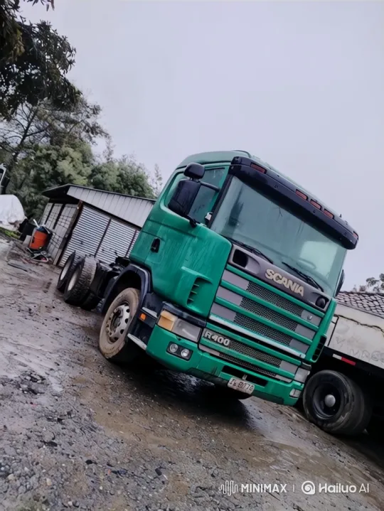 Scania Truck Displayed on Rainy Gravel Lot – AI Generated Video | Hailuo AI
