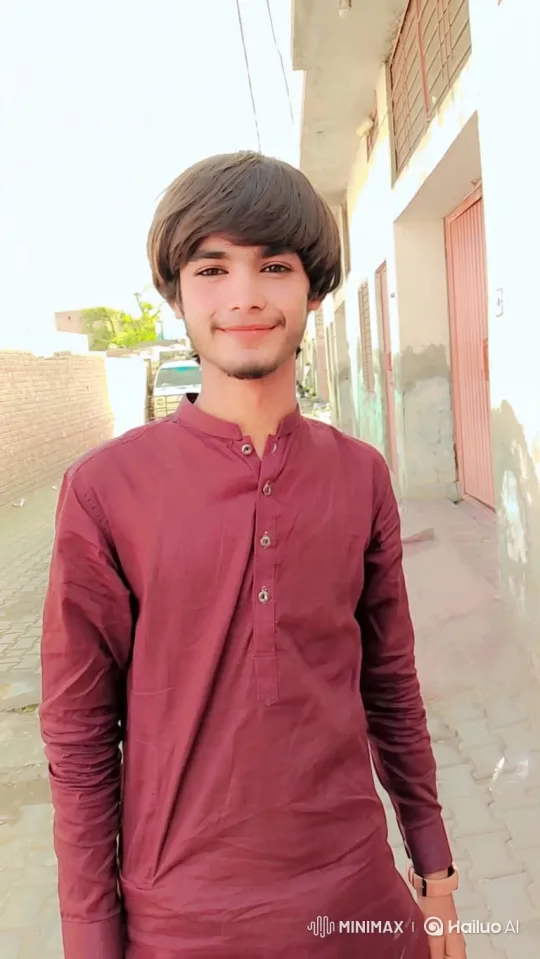 Young Man in Sunlit Alleyway with Gentle Smile – AI Generated Video | Hailuo AI