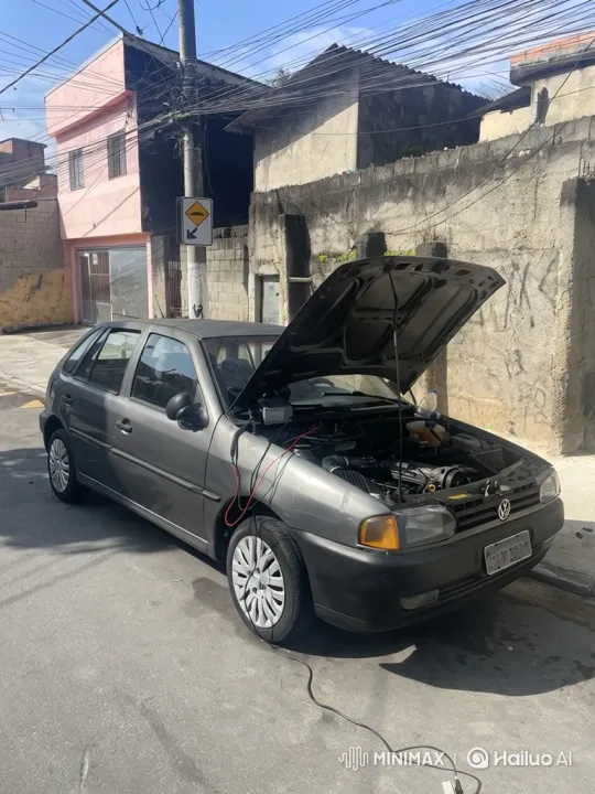 Urban Gray Hatchback Slowly Descends with Open Hood – AI Generated Video | Hailuo AI