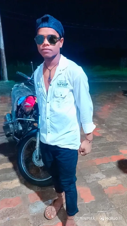 Young Man in Night Outfit Poses with Motorcycle – AI Generated Video | Hailuo AI