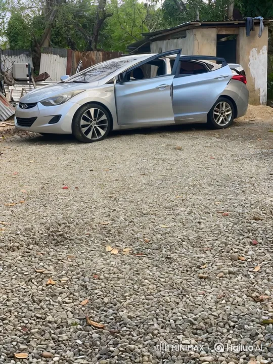 Silver Sedan Lowering on Gravel Driveway – AI Generated Video | Hailuo AI