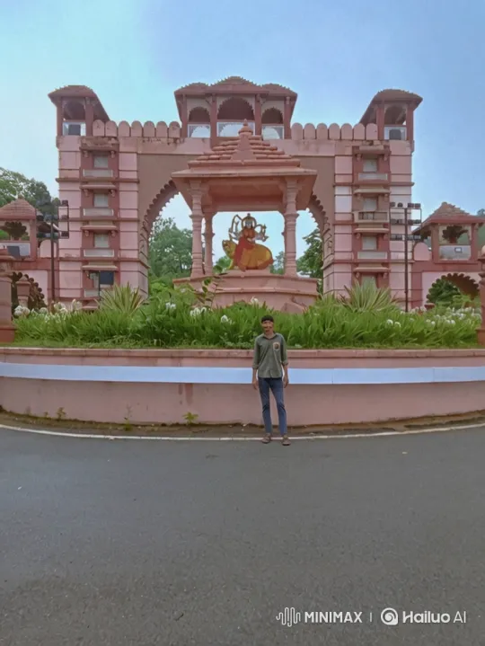 Young Man Admires Monument with Ornate Carvings – AI Generated Video | Hailuo AI