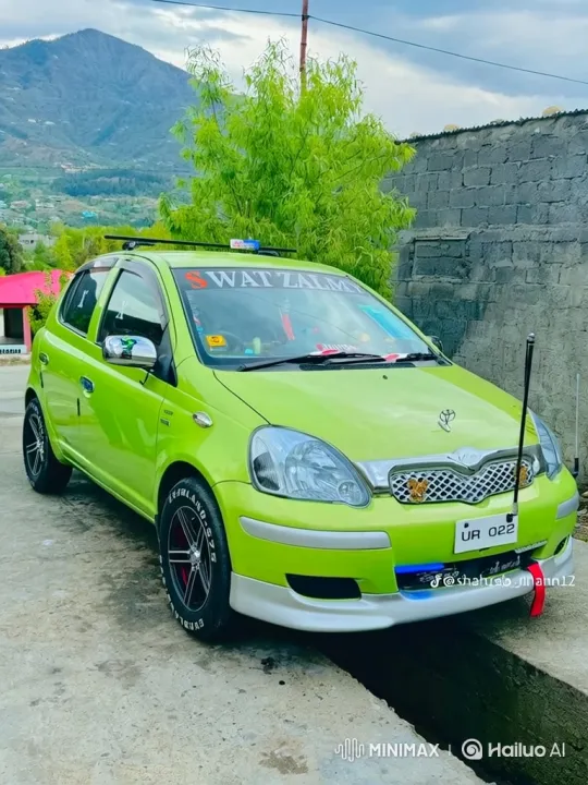 Lime-Green Hatchback Bouncing on Concrete Road – AI Generated Video | Hailuo AI