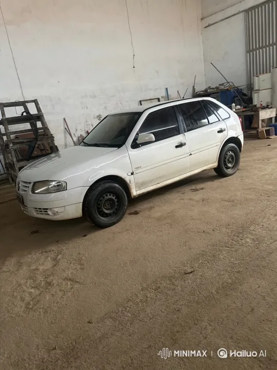 White Hatchback Lowering in Garage with Air Suspension – AI Generated Video | Hailuo AI