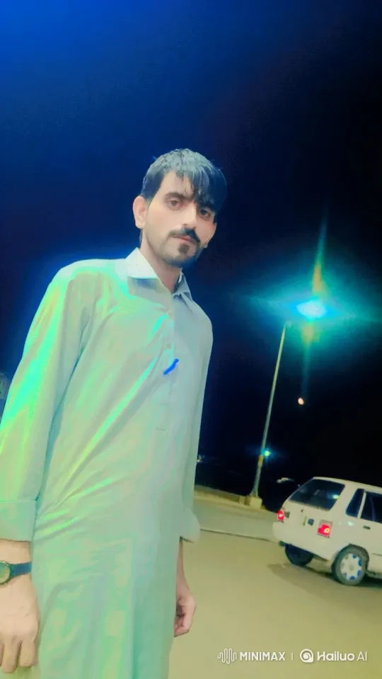 Nighttime Portrait of a Man with Minimal Movements – AI Generated Video | Hailuo AI