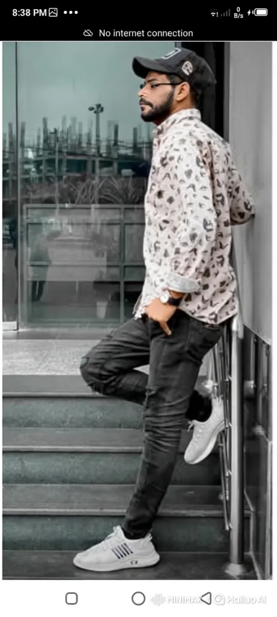 Young Man Poses on Stairs with Helicopter in Background – AI Generated Video | Hailuo AI