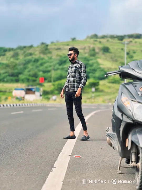 Young Man in Plaid Shirt Gazes at Camera on Roadside – AI Generated Video | Hailuo AI
