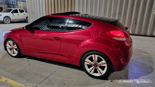 Red Hatchback with Custom Wheels and Underglow – AI Generated Video | Hailuo AI