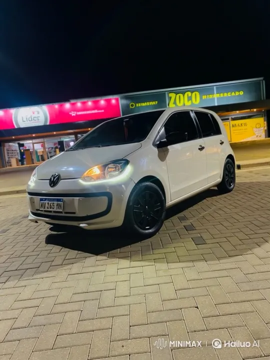 White Hatchback Lowers on Herringbone Brick Lot – AI Generated Video | Hailuo AI