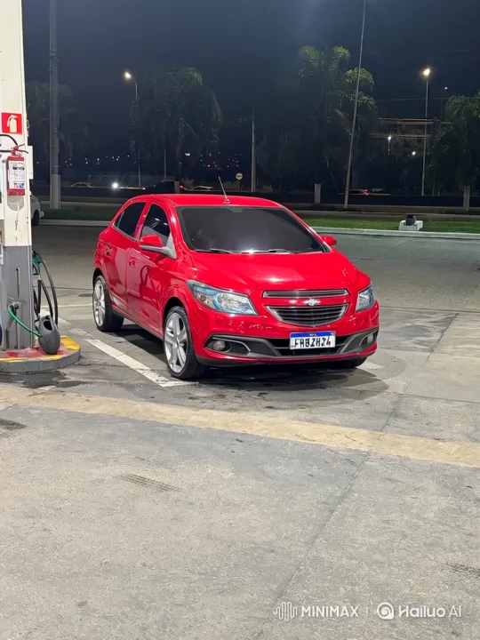 Red Hatchback Showcases Air Suspension at Night – AI Generated Video | Hailuo AI