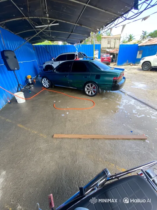 Green Sedan Mimics Air Suspension at Car Wash – AI Generated Video | Hailuo AI