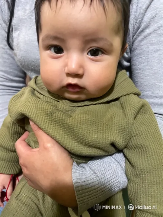 Baby's Joyful Dance in Cozy Olive-Green Outfit – AI Generated Video | Hailuo AI